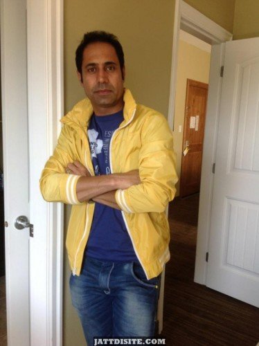 Binnu-Dhillon-Waering-Yellow-Jacket-600x803