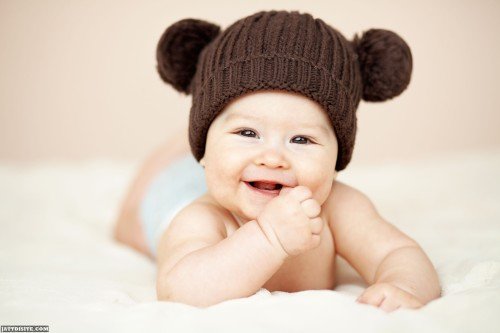Baby In Cute Woolen Cap