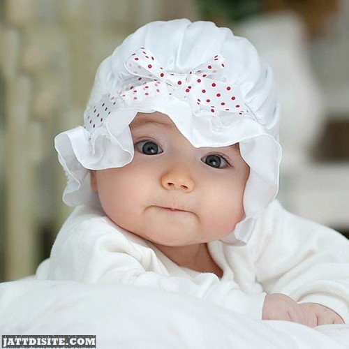 Baby In Lovely Clothes
