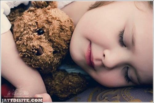 Child Baby with Cute Teddy Bear