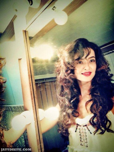 Surveen Chawla In Curly Hair