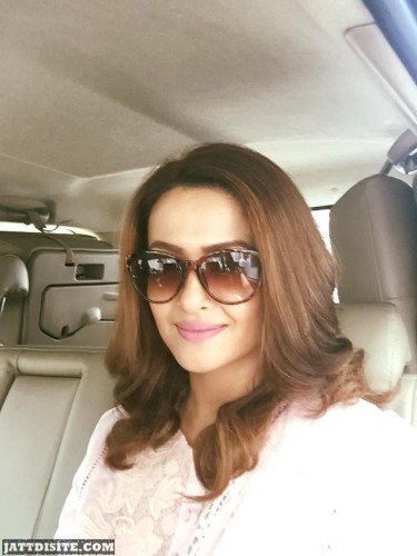 Surveen Chawla Smiling Photo In Car
