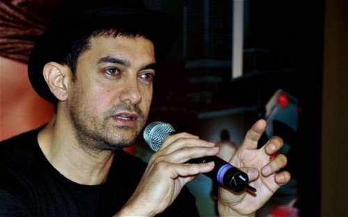 Aamir Khan Holding A mike